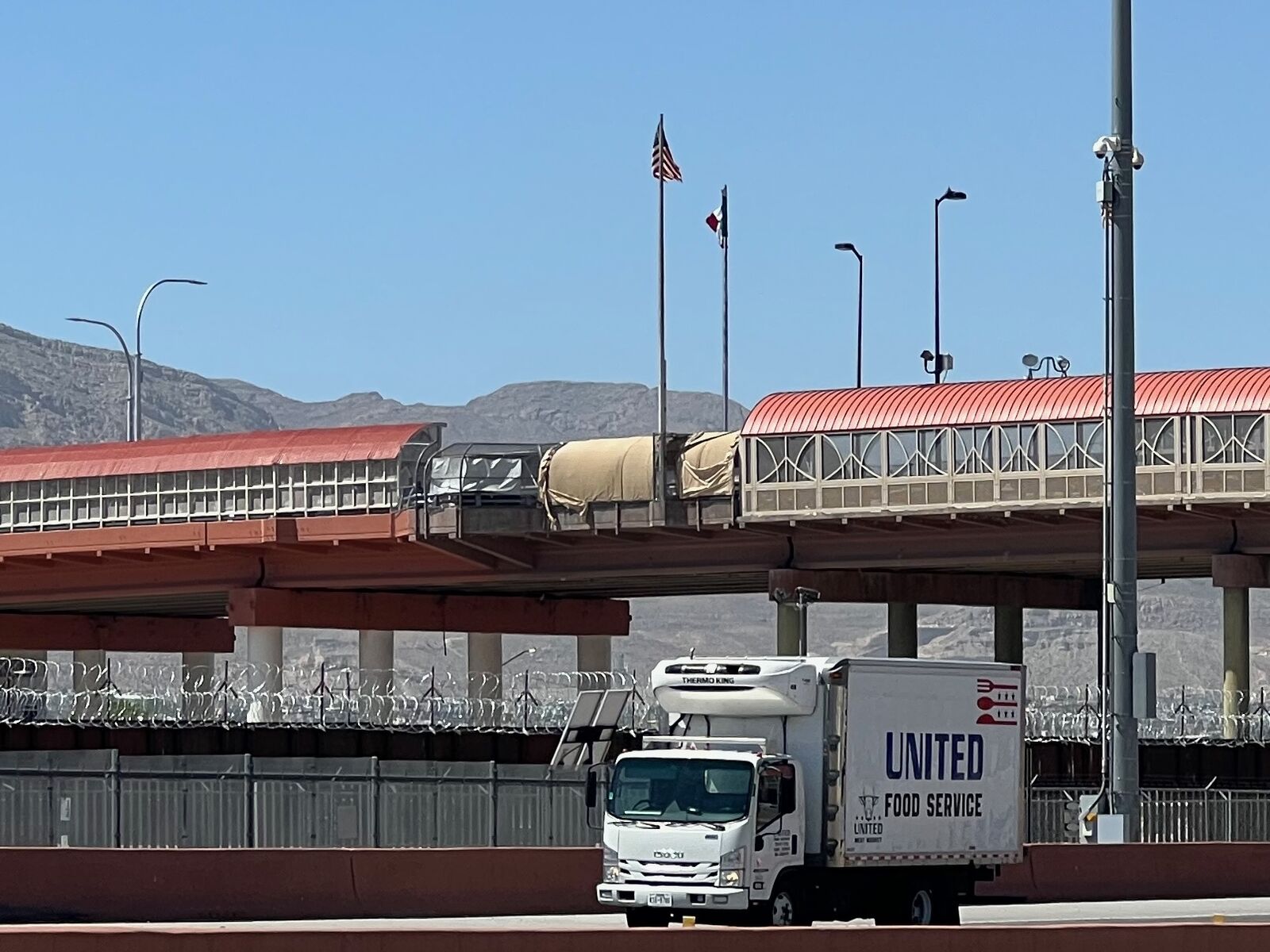 Bridge crossing, freight truck and rail cars