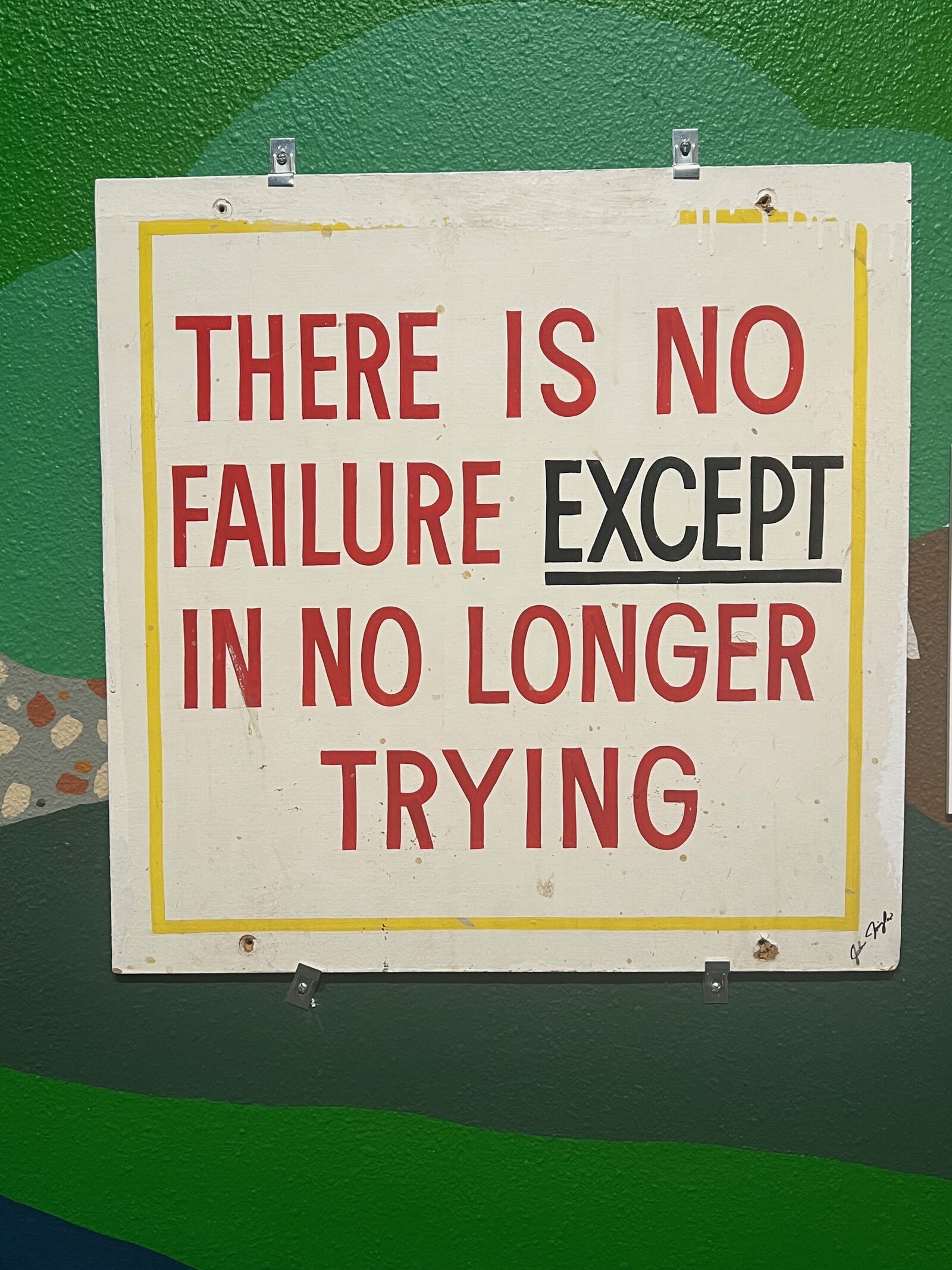 There Is No Failure Except in No Longer Trying, hand-lettered sign