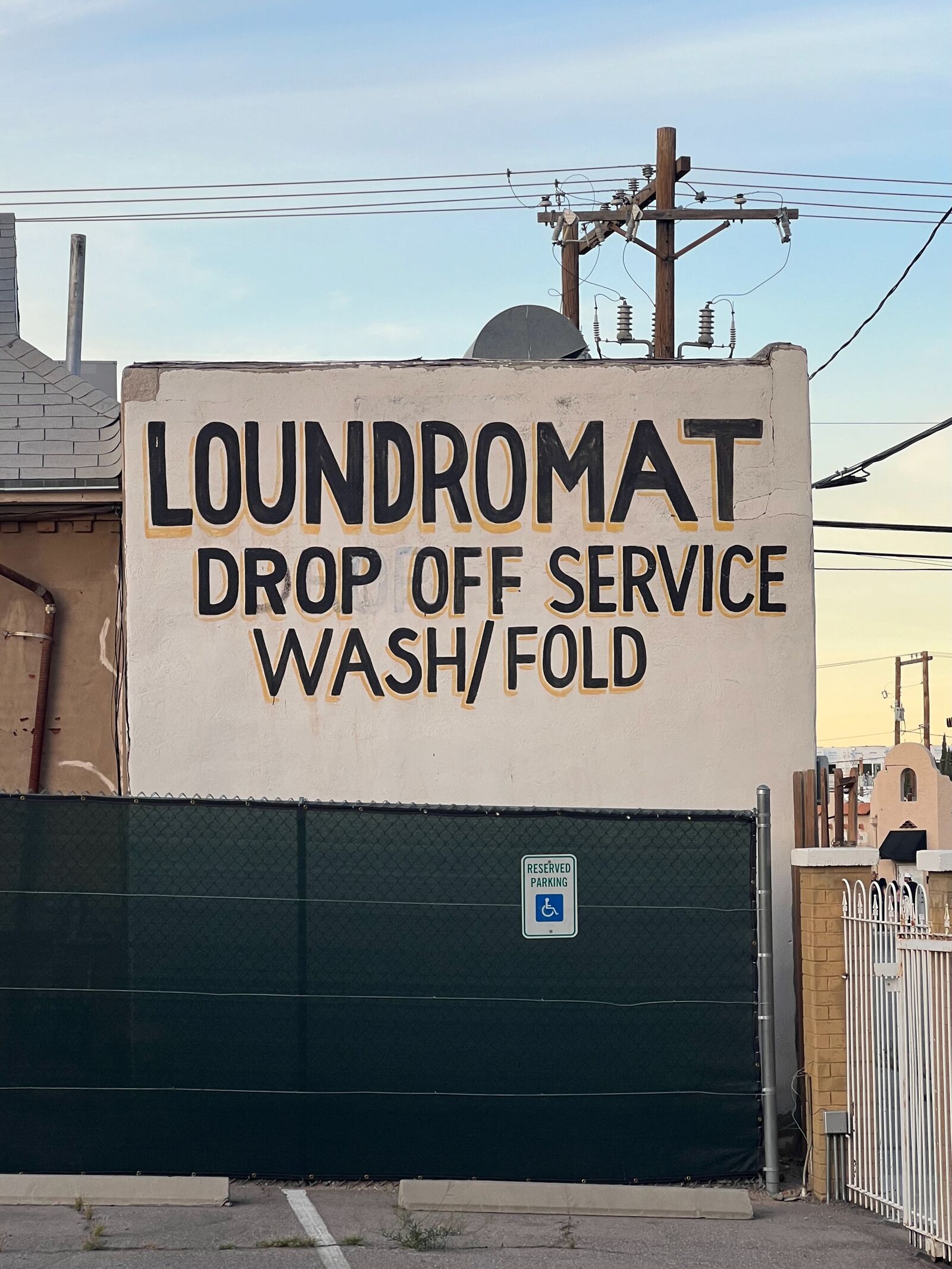 Laundromat sign, drop off service