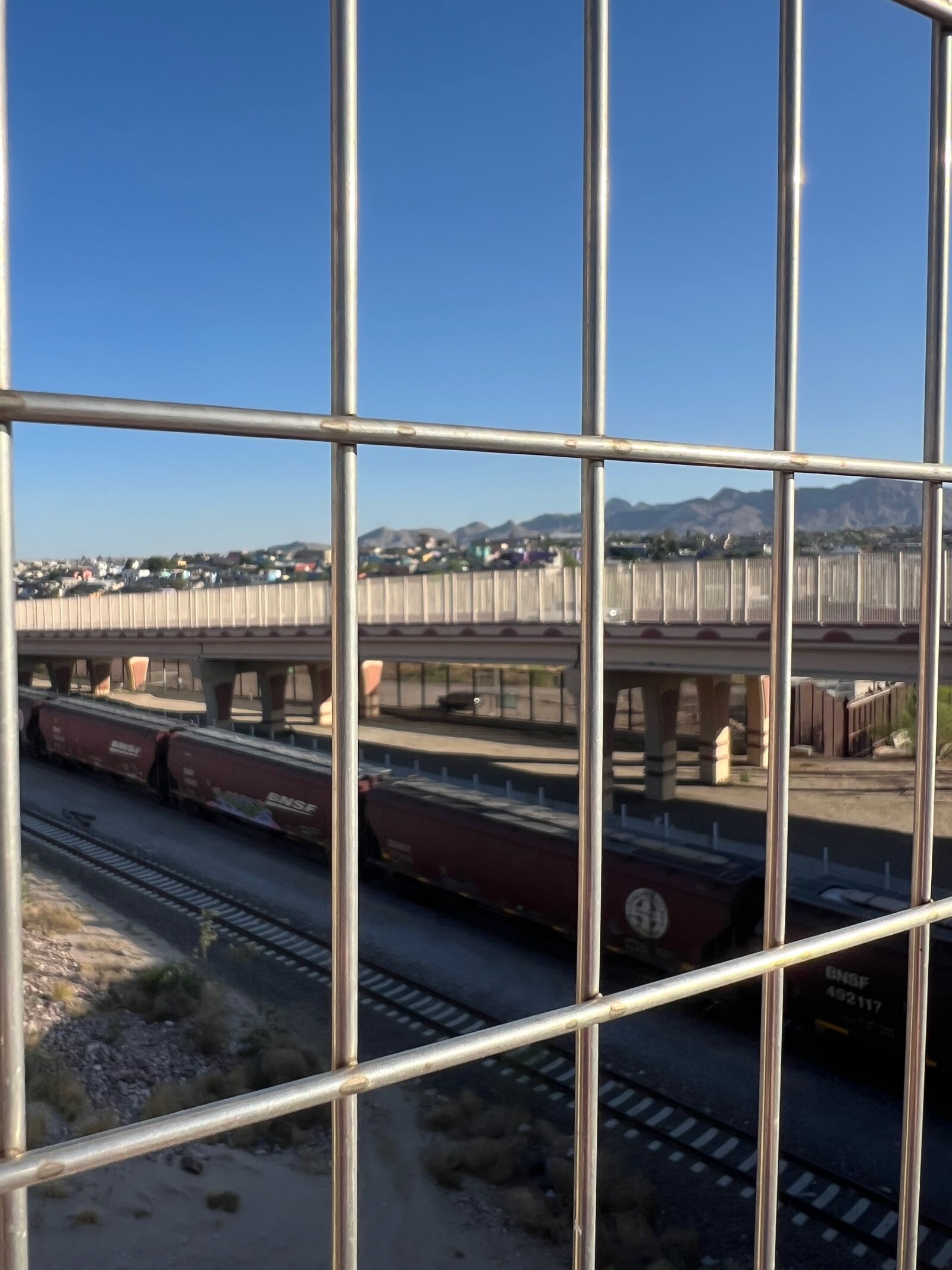 Border fence, rail yard