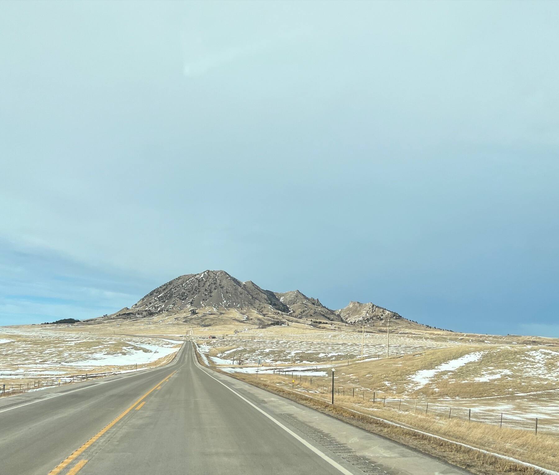 Open road heading toward Bear Butte, South Dakota