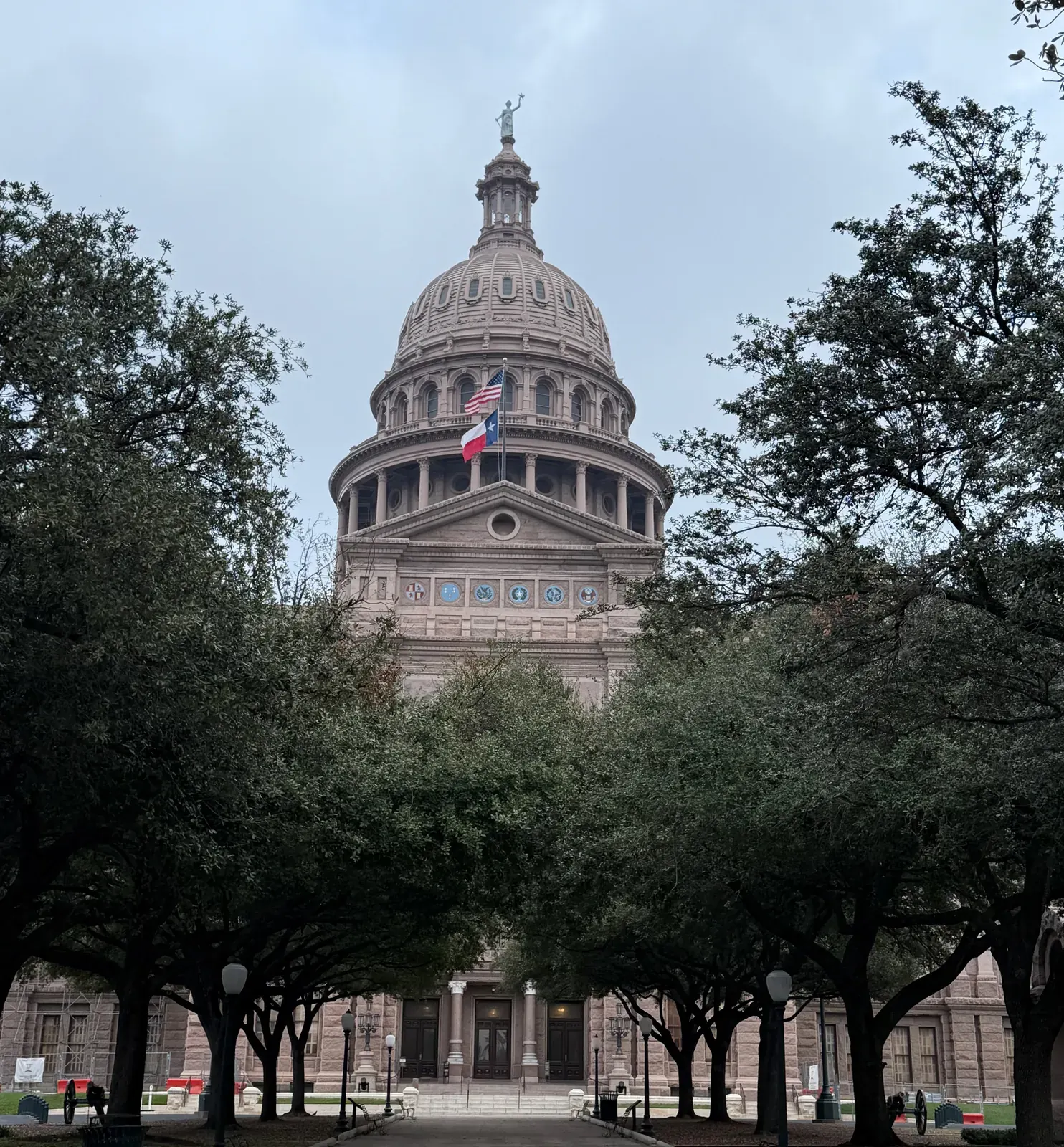 Texas State Capitol viewed through oak trees, Austin