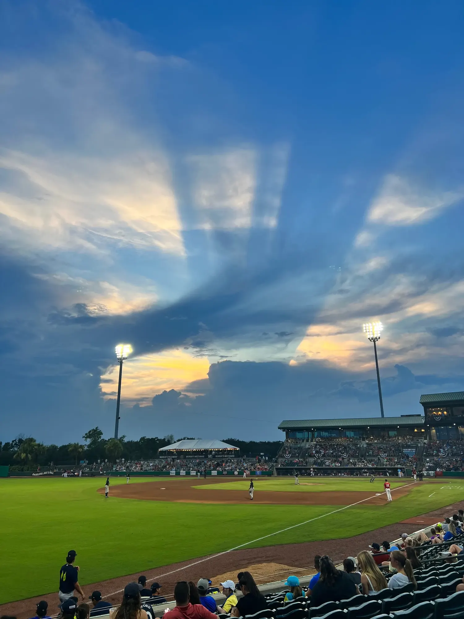 Sky over the RiverDogs stadium lights at dusk, Charleston