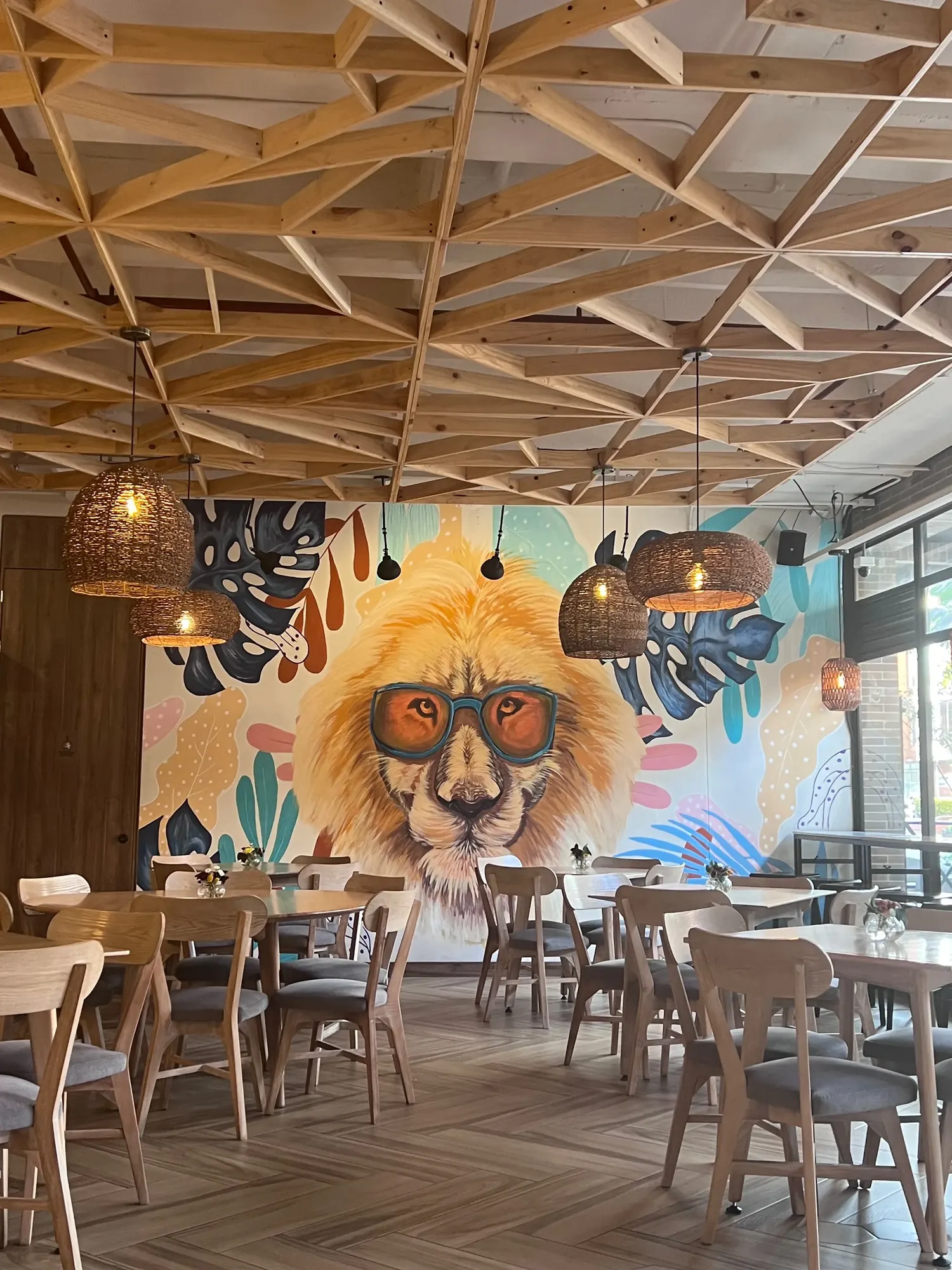 Lion mural inside Culto, a cafe in Bogota