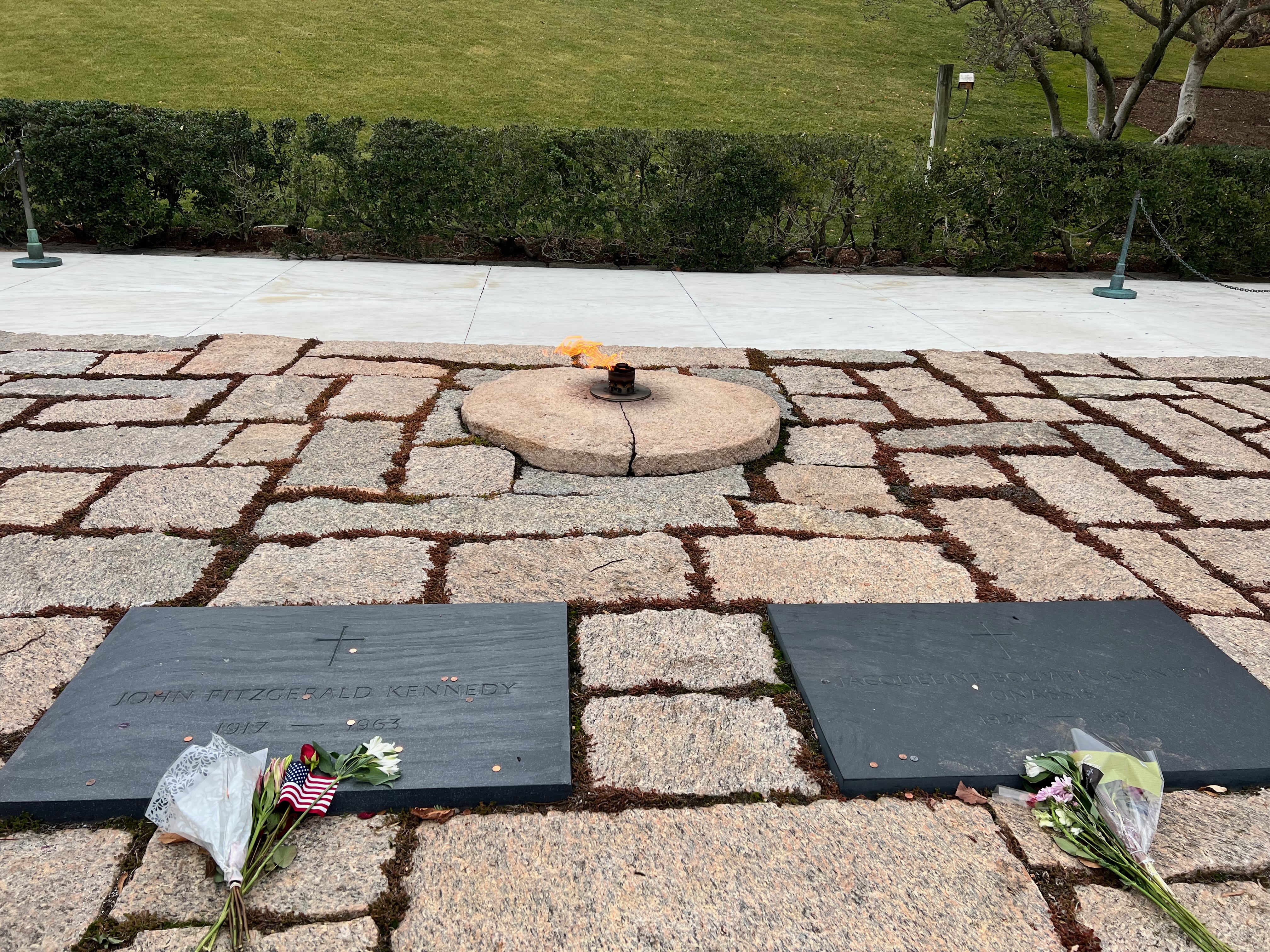 Kennedy grave with eternal flame and fresh flowers