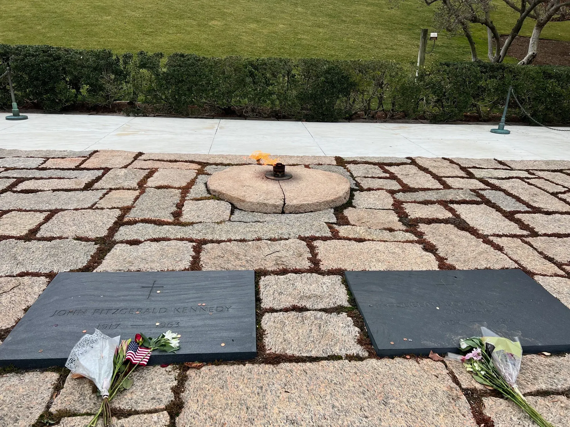Kennedy grave with eternal flame and fresh flowers