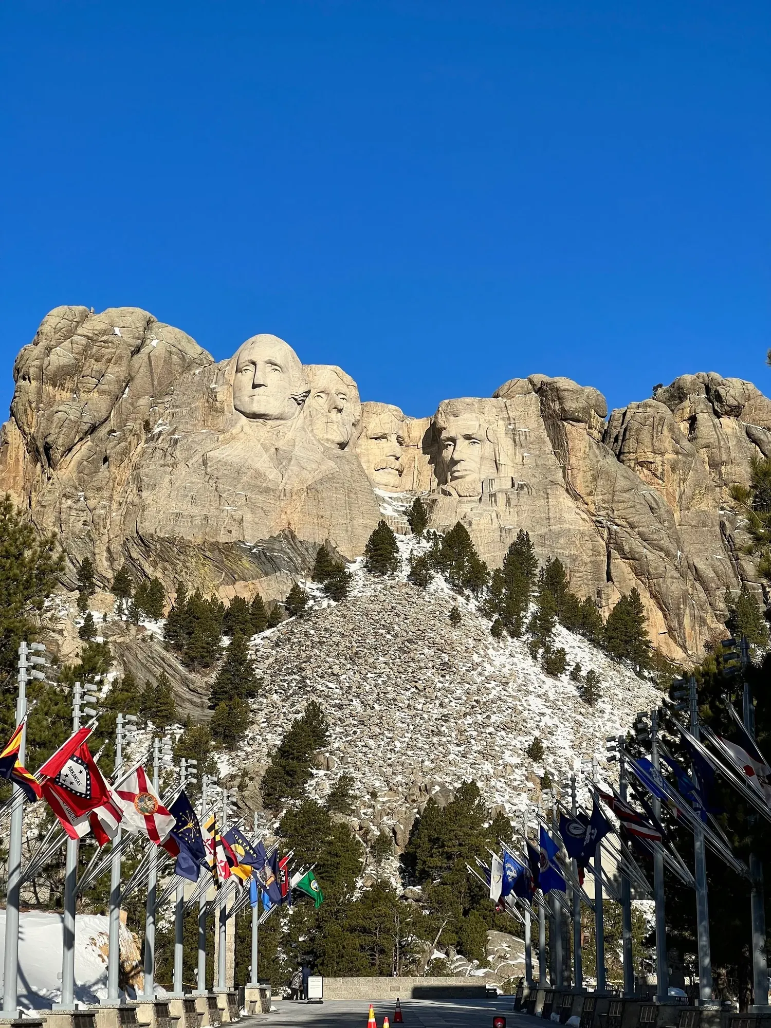 Mount Rushmore framed by the Avenue of Flags